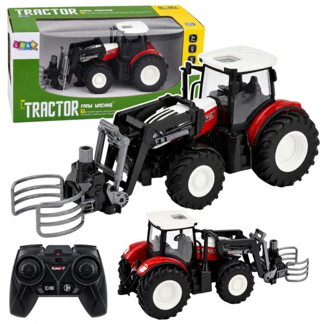 <img src='https://webimage.pl/pics/369/5/d5907990205369.jpg' style='height:440px' /> Traktor z chwytakiem do bel R/C 1:24