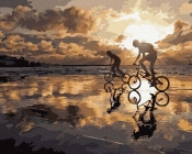 Jazda na rowerze o zachodzie słońca 40 x 50 cm