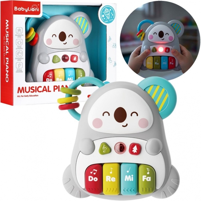 <img src='https://webimage.pl/pics/407/9/d5901353699017.jpg' style='height:440px' /> Pianinko muzyczne koala dla malucha