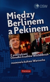 Między Berlinem a Pekinem - Łukasz Warzecha