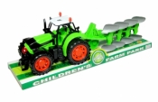 Traktor z pługiem