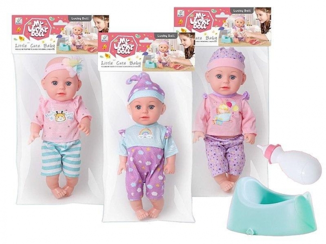 Lalka z nocnikiem i z butelką 35cm