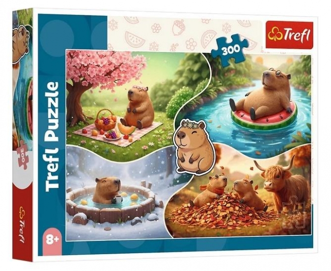 <img src='https://webimage.pl/pics/529/0/d5900511230529.jpg' style='height:440px' /> Puzzle 300 Cztery pory roku z kapibarami