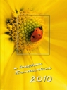Kalendarz 2010 z księdzem Twardowskim żółty