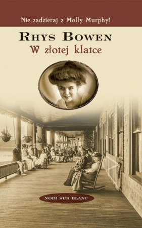 W złotej klatce - Rhys Bowen