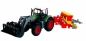 Traktor z turem i siewnikiem