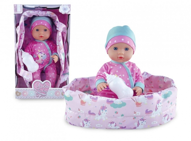 Lalka bobas w nosidełku