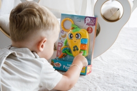 Carotina Baby - Zabawka elektroniczna z grzechotką Papriko