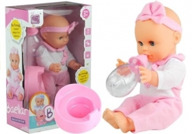 Lalka Bobas z nocnikiem i butelką pije sika