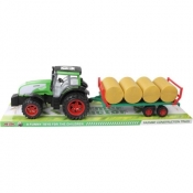 Traktor gigant z belami siana